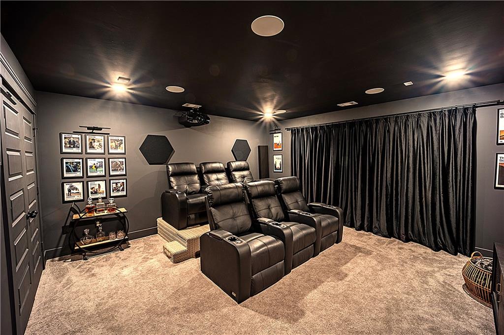 6833 Benjamin Drive Flowery Branch, GA 30542 - Photo 23 of 30 a living room with furniture gym equipment and a window