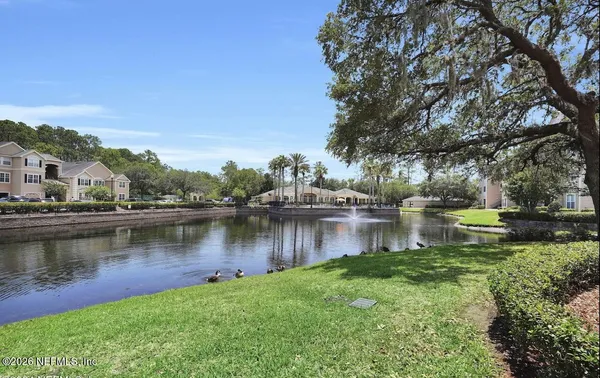 a view of a lake with houses