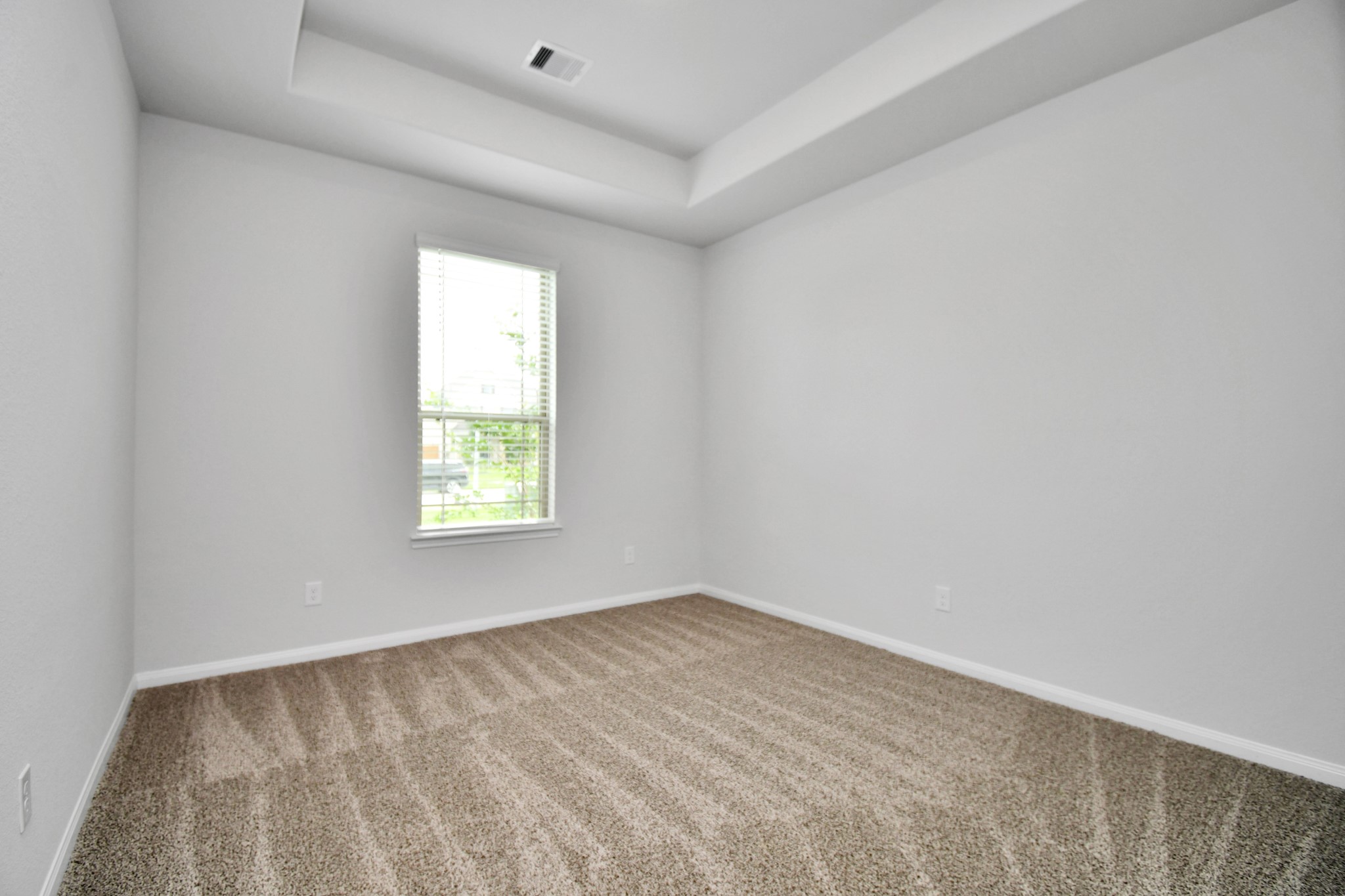 395 Hunter Ranch Way Dayton, TX 77535 - Photo 25 of 42 an empty room with a window