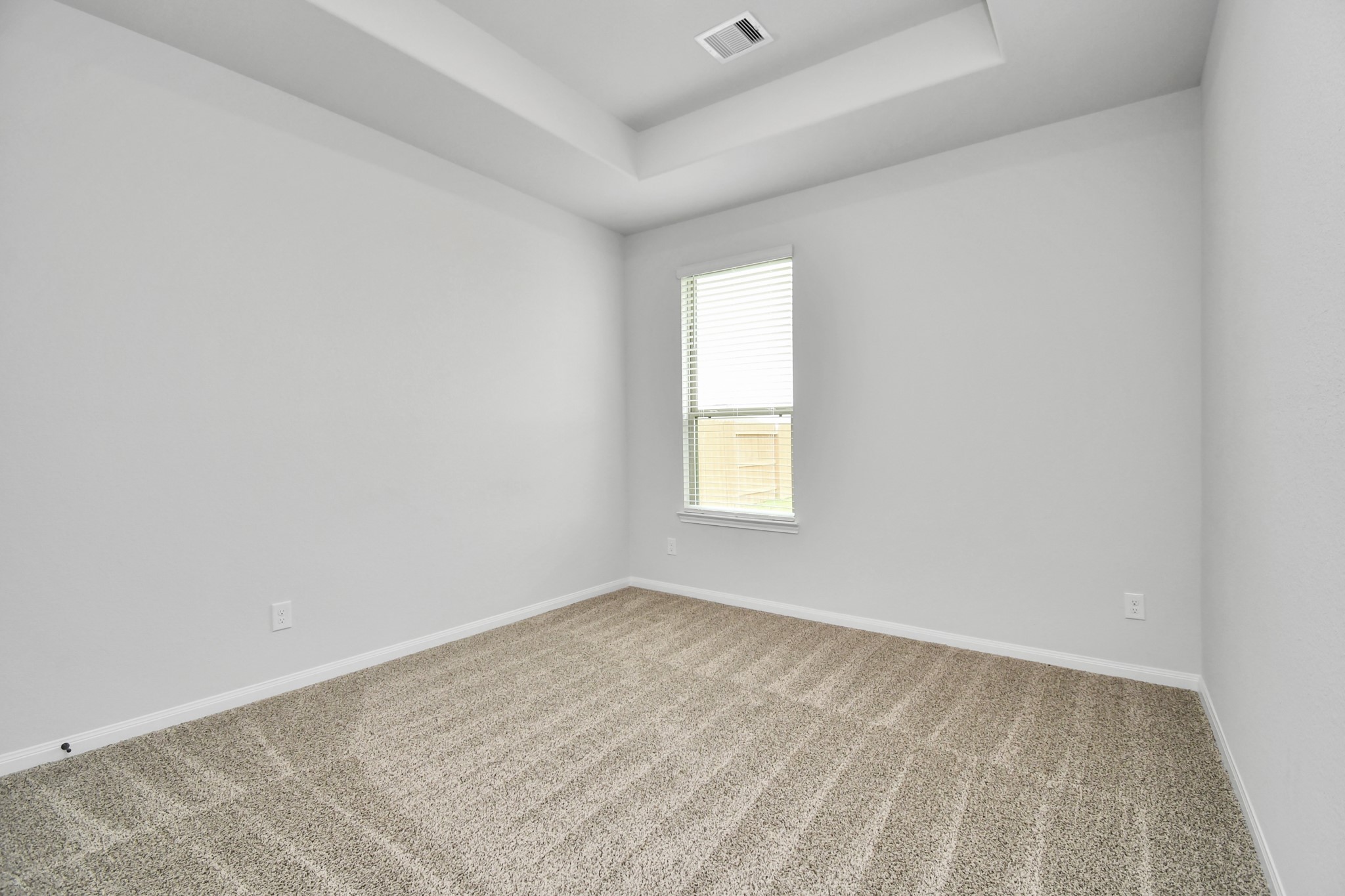 395 Hunter Ranch Way Dayton, TX 77535 - Photo 27 of 42 an empty room with a window