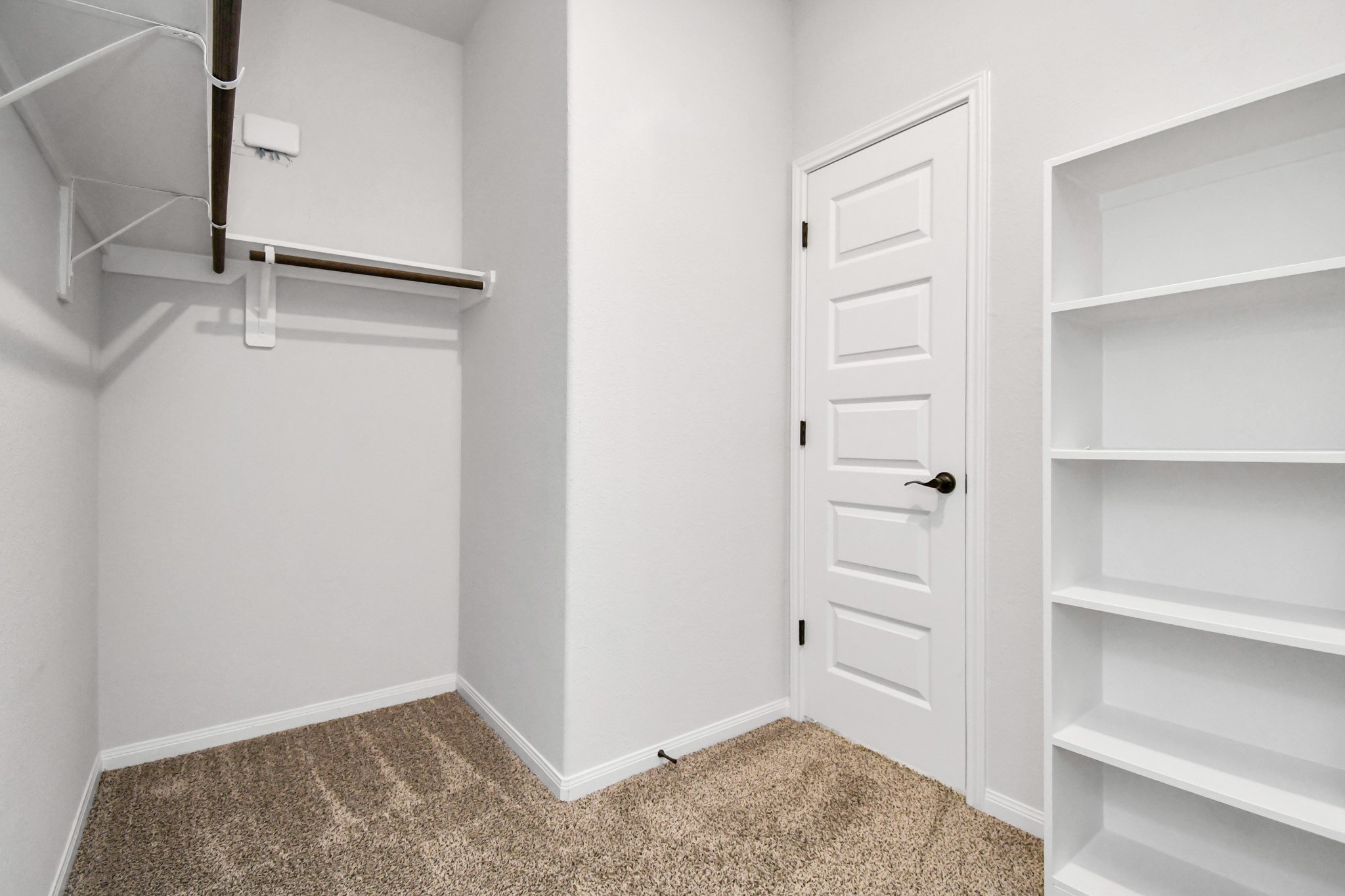395 Hunter Ranch Way Dayton, TX 77535 - Photo 39 of 42 a view of an empty walk in closet