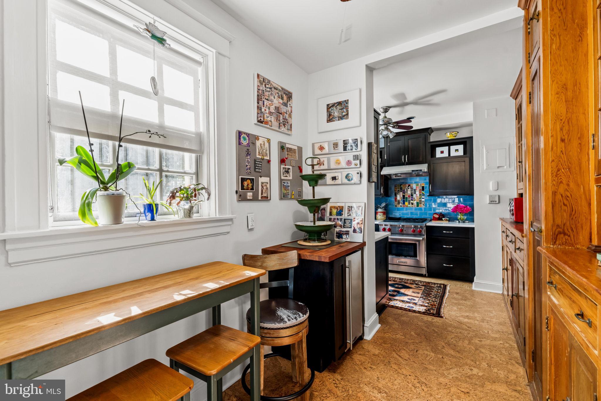 4300 Roland Avenue, Unit 101 Baltimore, MD 21210 - Photo 13 of 41 a dining room with furniture and a window