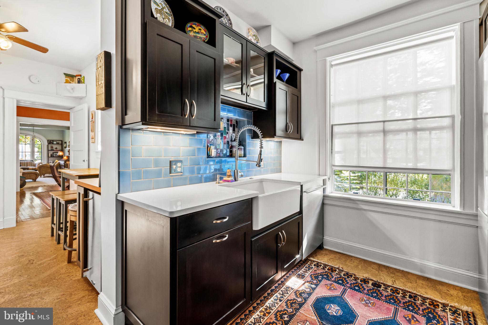 4300 Roland Avenue, Unit 101 Baltimore, MD 21210 - Photo 20 of 41 a kitchen with stainless steel appliances granite countertop a sink stove and refrigerator