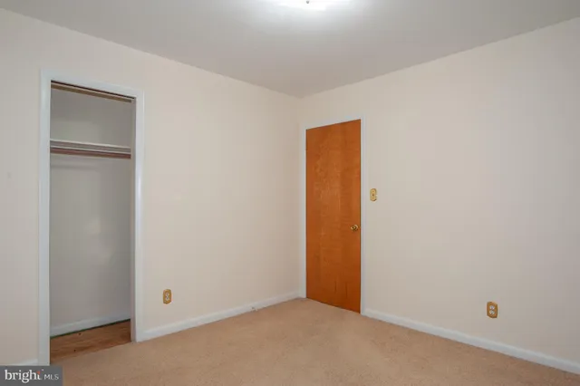 an empty room with closet