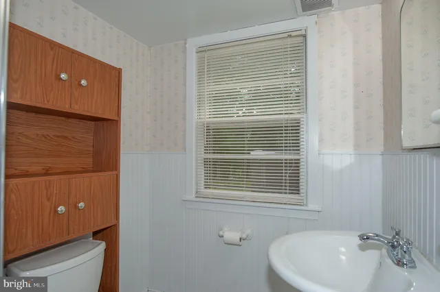 a bathroom with a sink and a bathtub