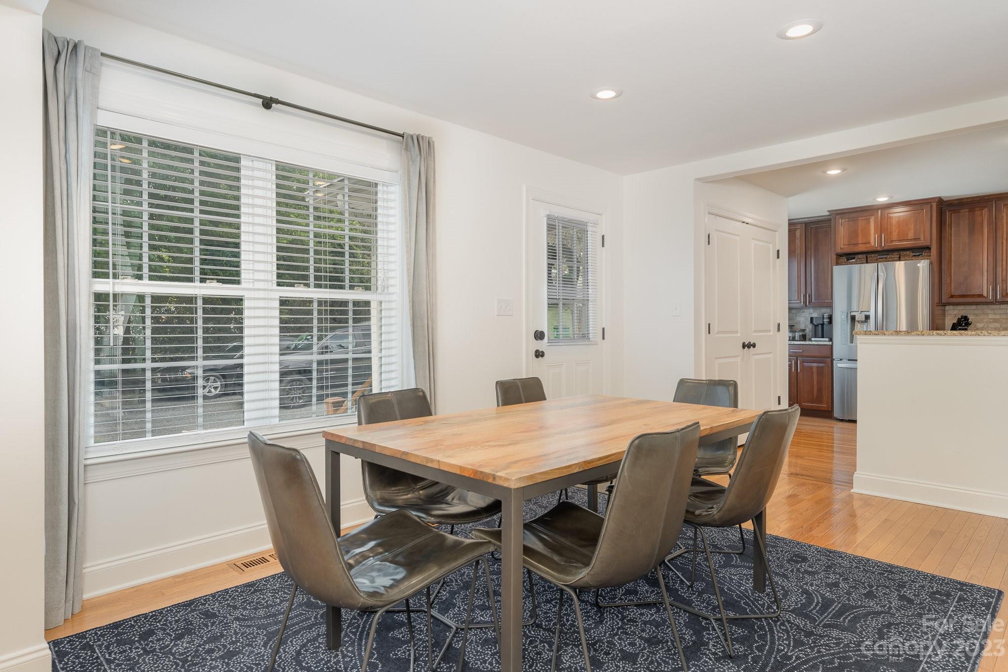 5816 Sharon Road Charlotte, NC 28210 - Photo 13 of 33 a view of a dining room with furniture window and outside view