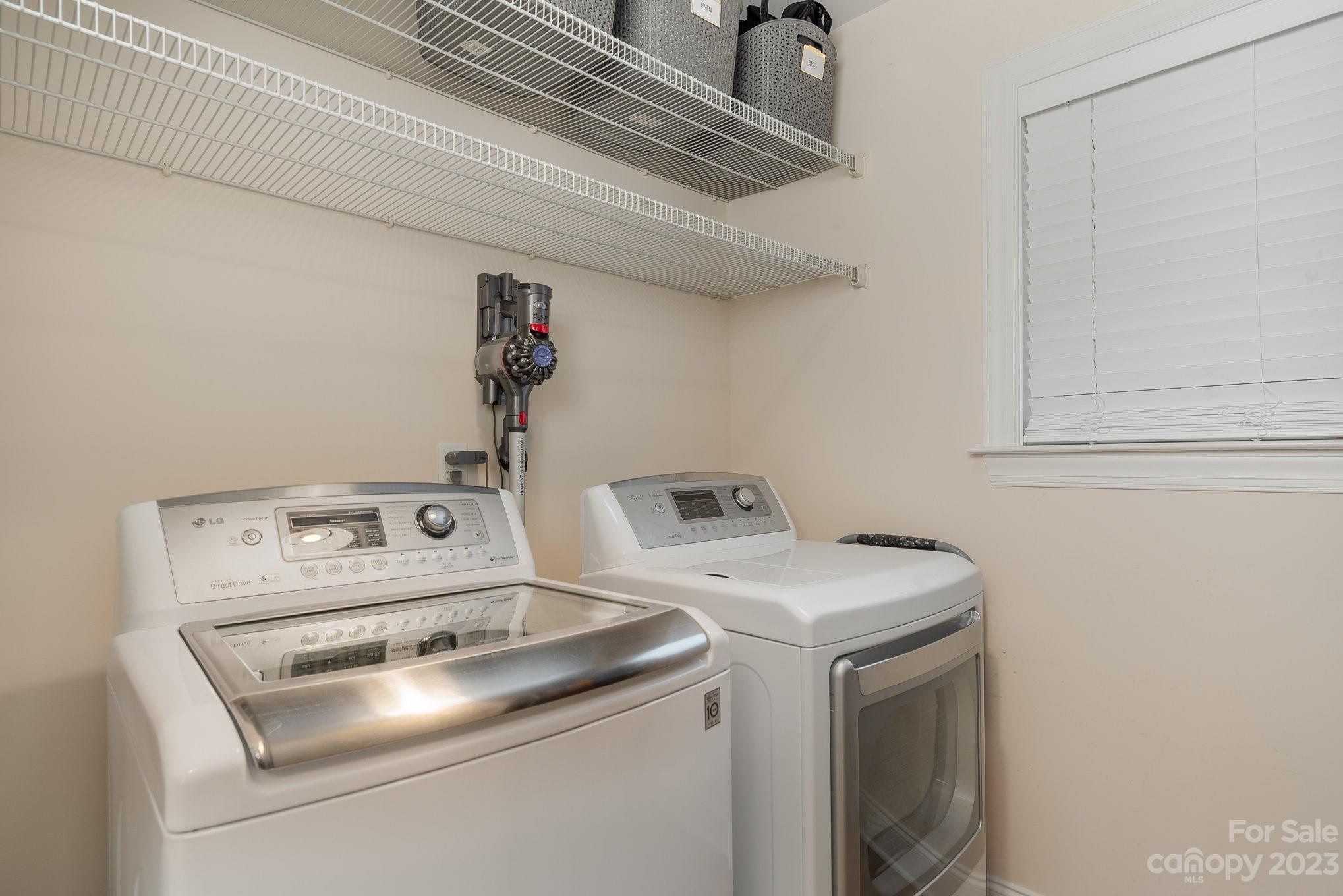 5816 Sharon Road Charlotte, NC 28210 - Photo 33 of 33 a utility room with dryer and washer