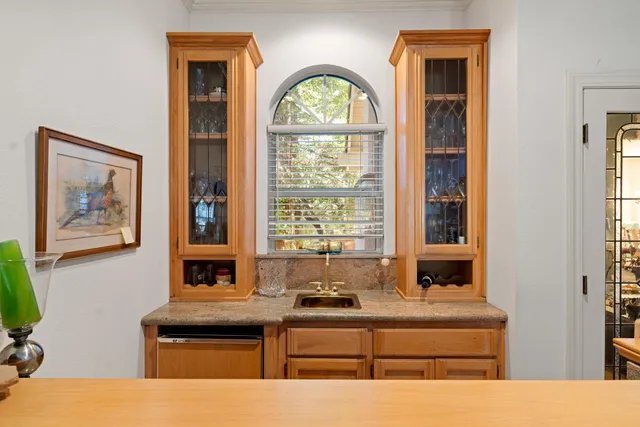 a living room with furniture fireplace and flat screen tv