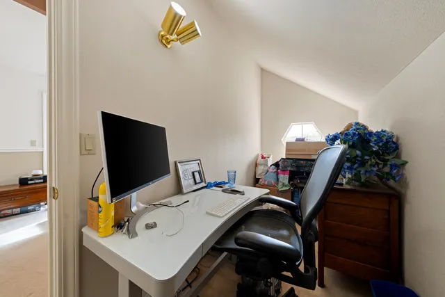 a view of a lake with a yard