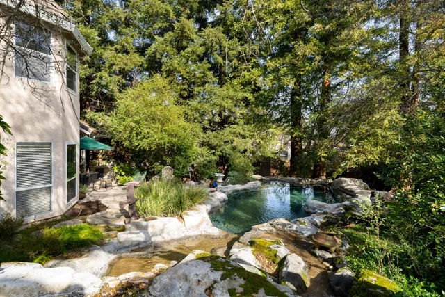 a backyard of a house with lots of green space