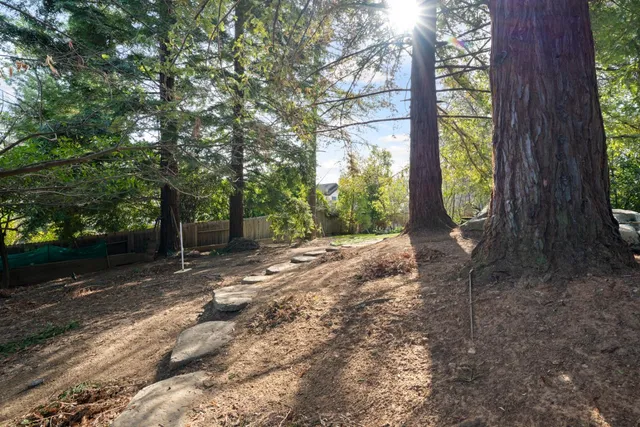 an aerial view of residential house with outdoor space
