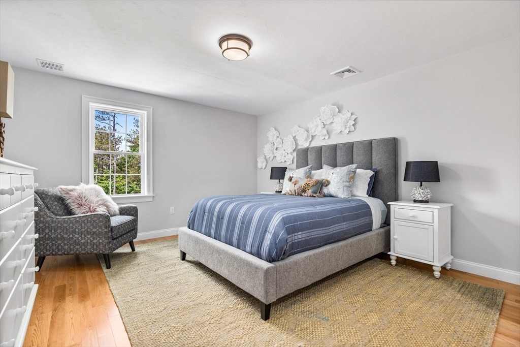 3 Grace Way, Unit 3 Scituate, MA 02066 - Photo 14 of 17 a bedroom with bed and a window