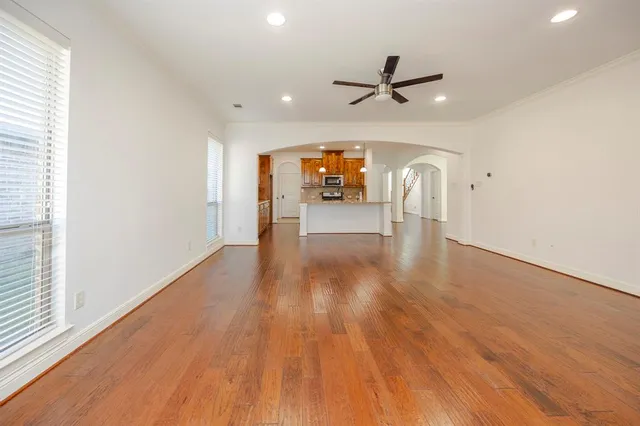 a view of a livingroom with wooden floor