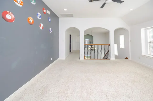 a view of entryway with kitchen
