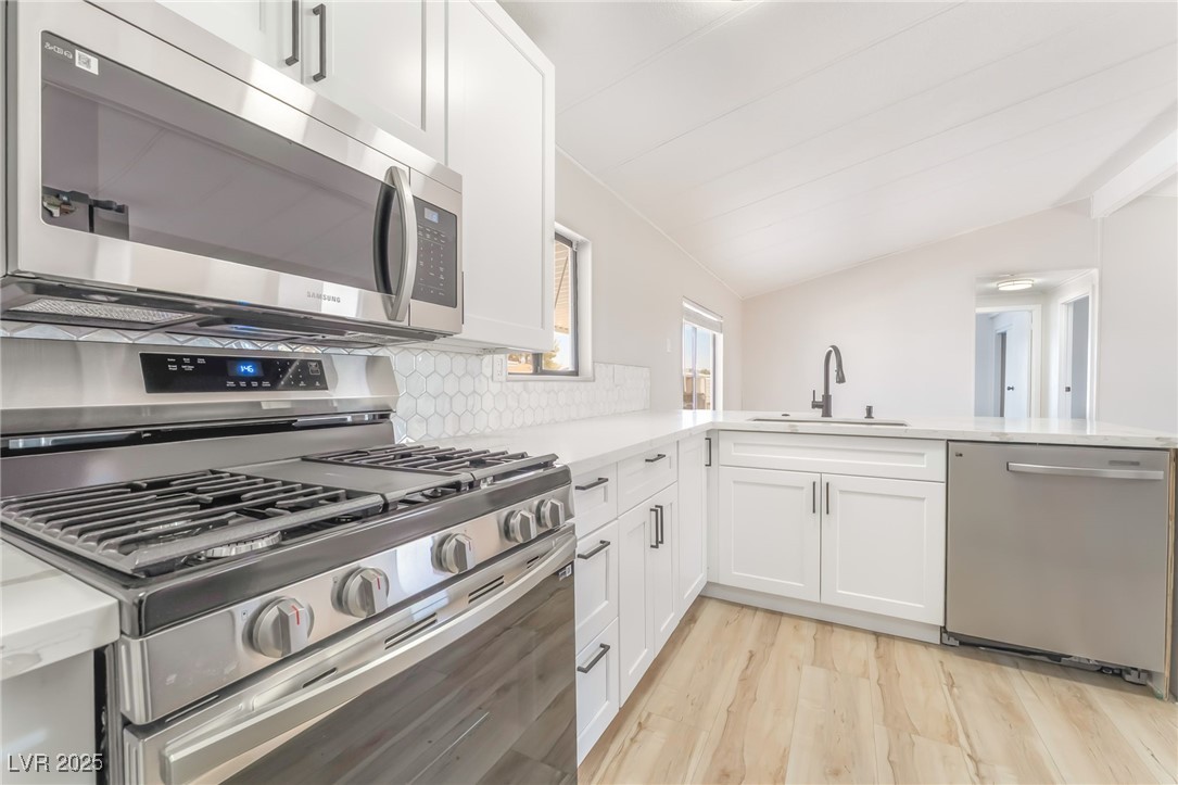 5552 Aldama Road Las Vegas, NV 89122 - Photo 13 of 35 Kitchen featuring appliances with stainless steel