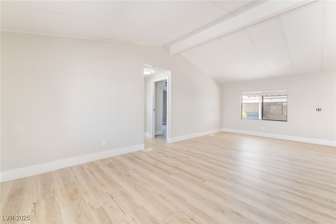 5552 Aldama Road Las Vegas, NV 89122 - Photo 17 of 35 Spare room featuring light wood-type flooring and