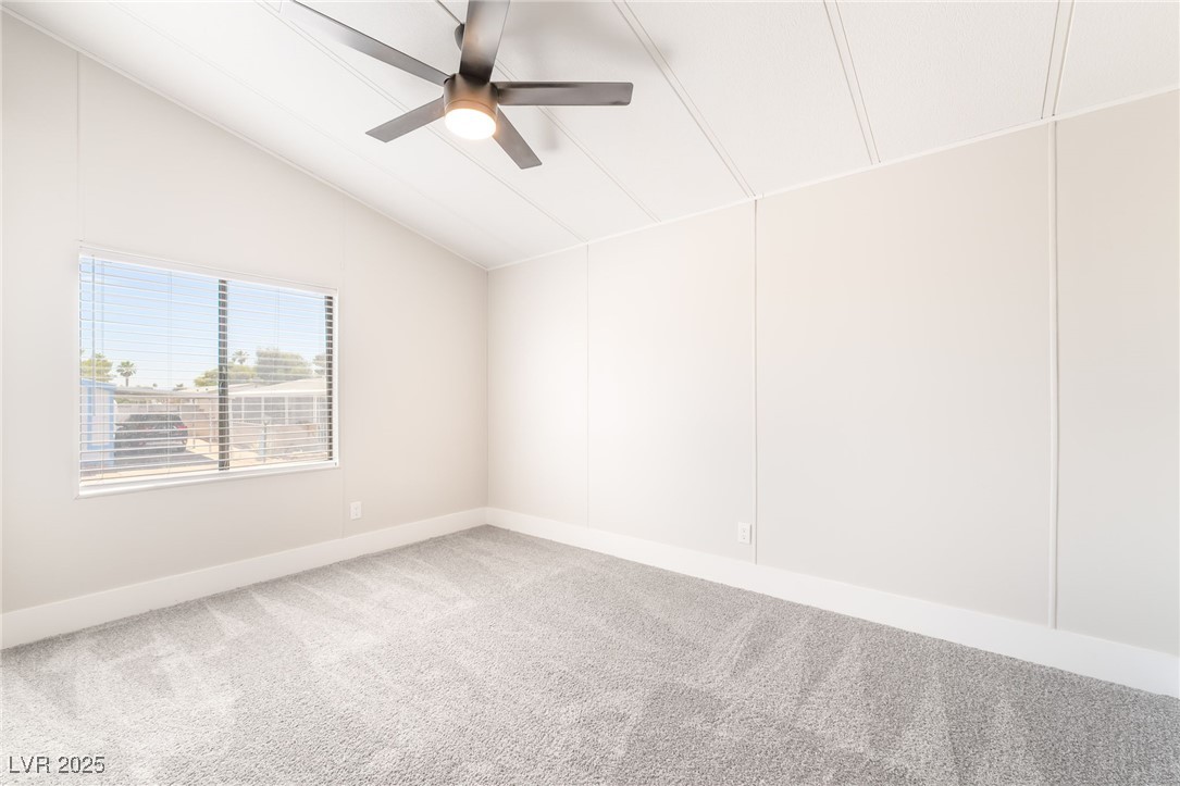 5552 Aldama Road Las Vegas, NV 89122 - Photo 25 of 35 Carpeted empty room featuring ceiling fan and vaul