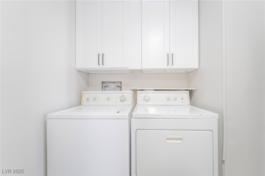 5552 Aldama Road Las Vegas, NV 89122 - Photo 31 of 35 Laundry room featuring washer and clothes dryer an