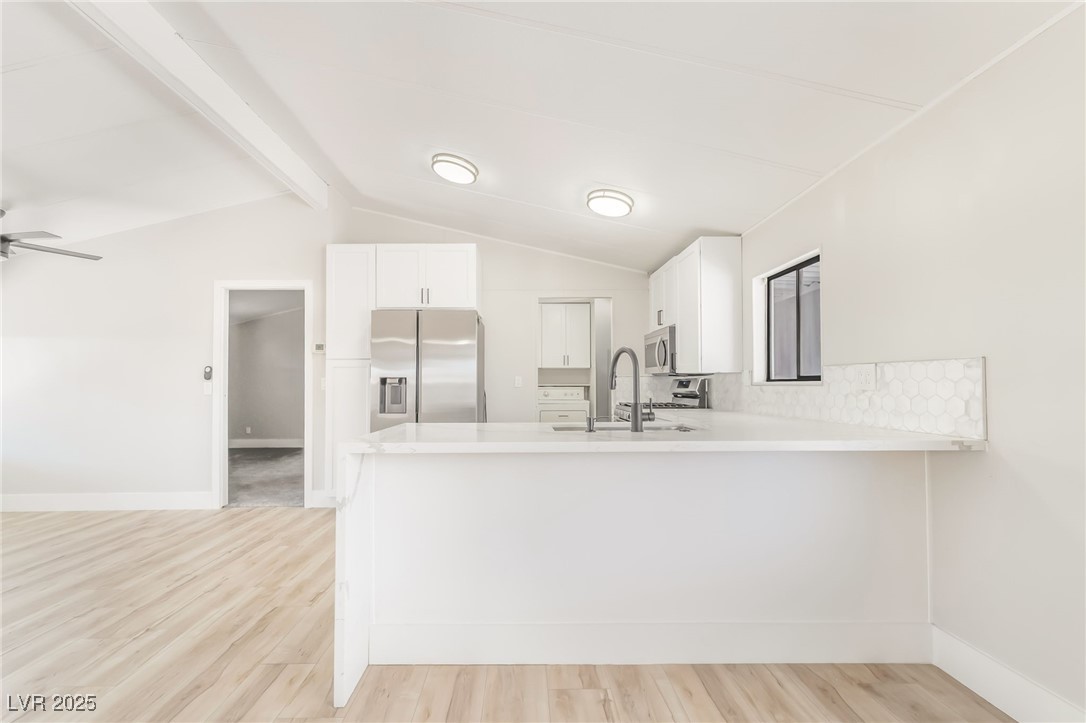 5552 Aldama Road Las Vegas, NV 89122 - Photo 10 of 35 Kitchen featuring appliances with stainless steel