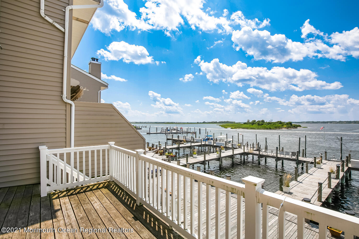 1332 Ocean Avenue, Unit 5R Sea Bright, NJ 07760 - Photo 12 of 40 a view of a balcony with wooden floor