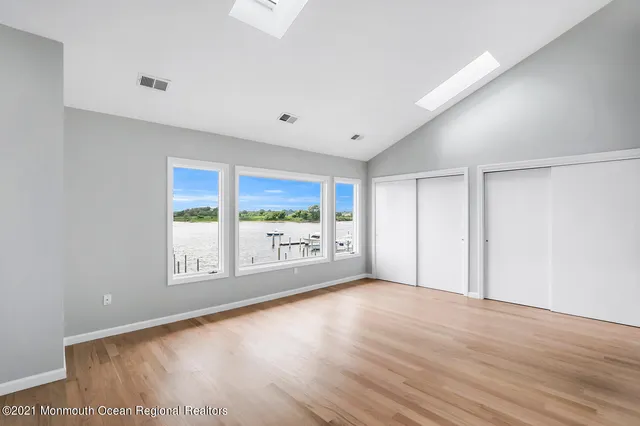 a bathroom with a double vanity sink mirror double and shower
