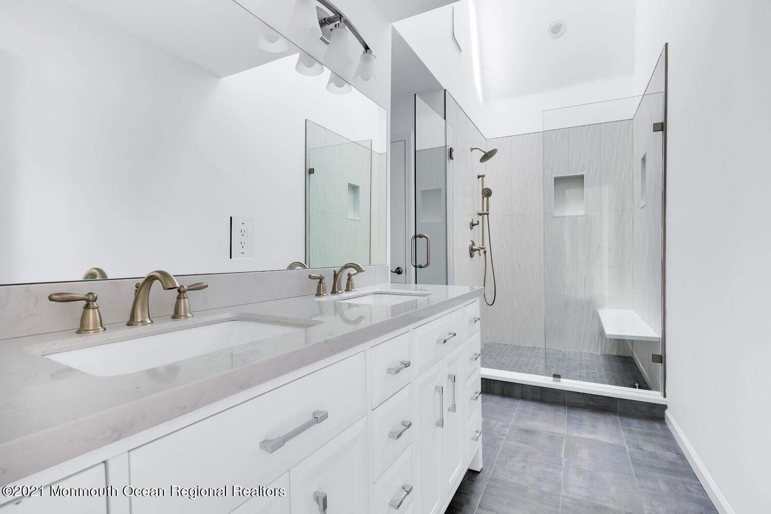 1332 Ocean Avenue, Unit 5R Sea Bright, NJ 07760 - Photo 22 of 40 a bathroom with a double vanity sink mirror double and shower