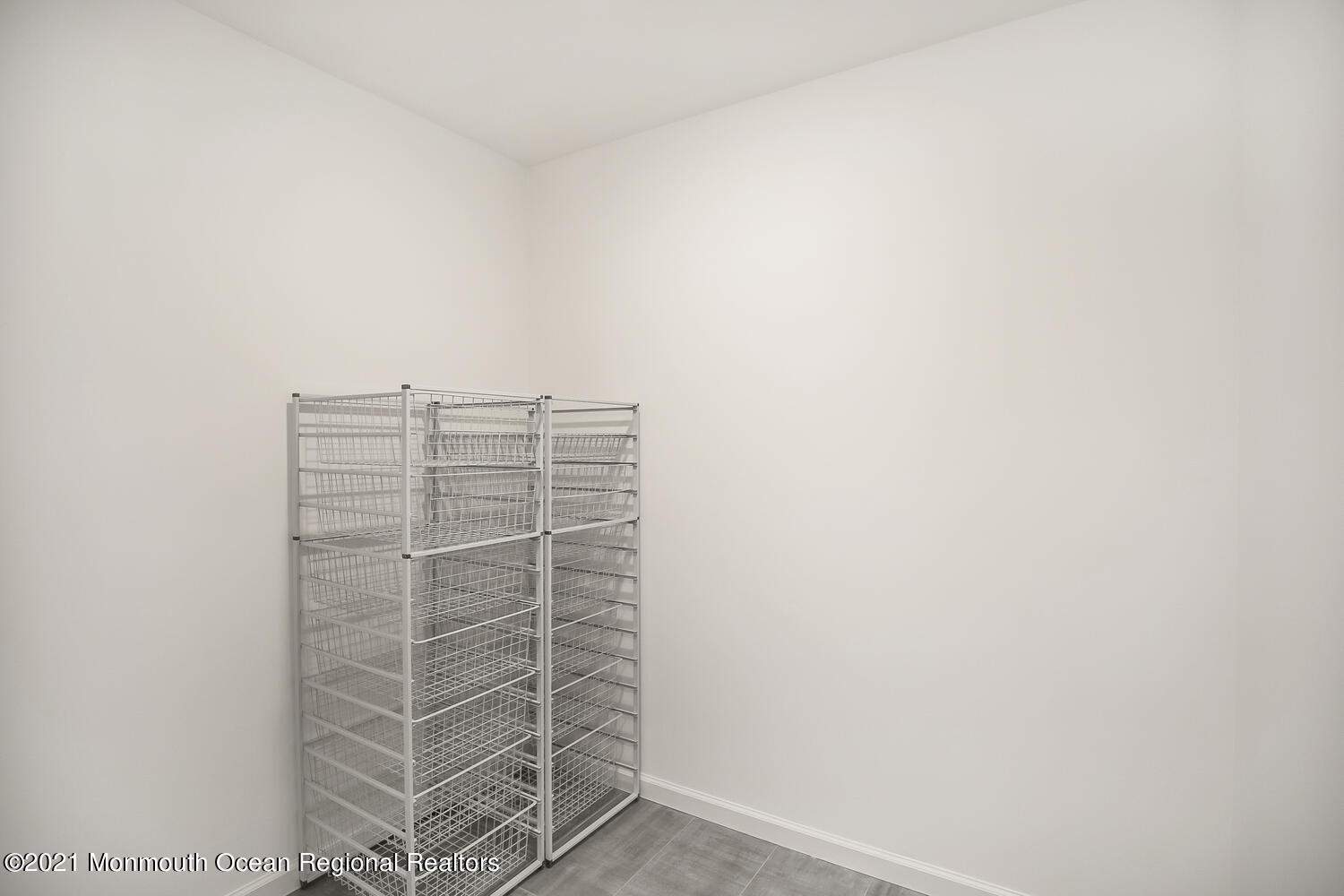 1332 Ocean Avenue, Unit 5R Sea Bright, NJ 07760 - Photo 24 of 40 a view of room with staircase