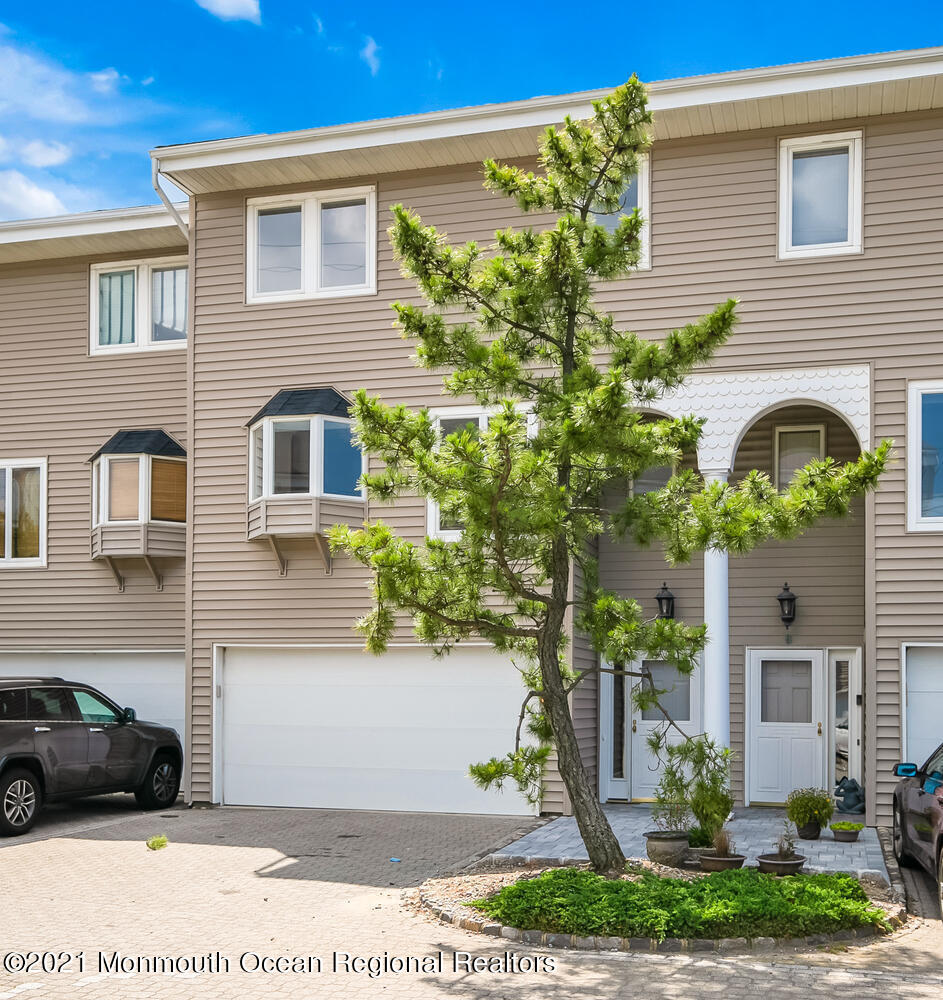 1332 Ocean Avenue, Unit 5R Sea Bright, NJ 07760 - Photo 40 of 40 a front view of a house with garden