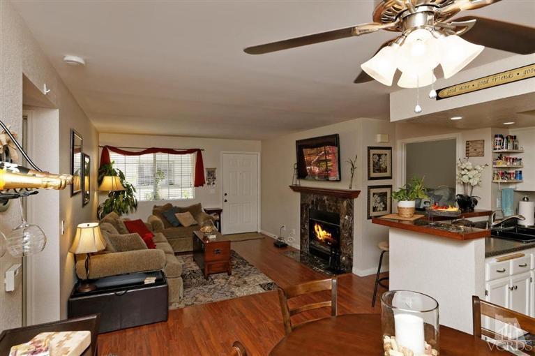 1007 Waltham Road, Unit F Simi Valley, CA 93065 - Photo 13 of 32 a living room with furniture and a fireplace