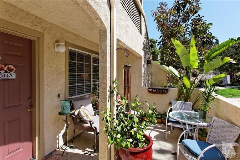 1007 Waltham Road, Unit F Simi Valley, CA 93065 - Photo 4 of 32 a view of a chair and tables in the balcony