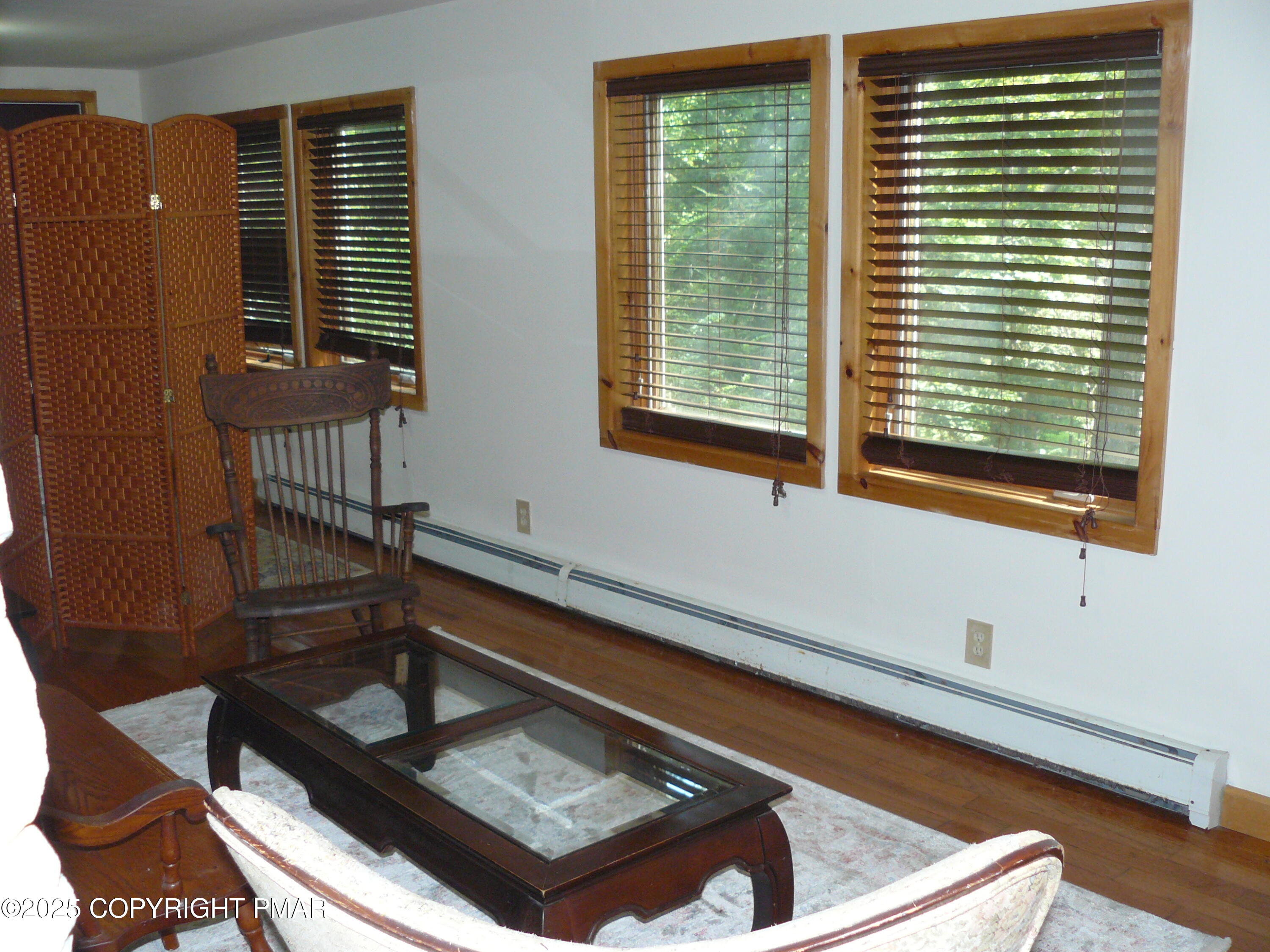3128 Old Canadensis Hill Road Cresco, PA 18326 - Photo 2 of 9 a view of a living room and a window
