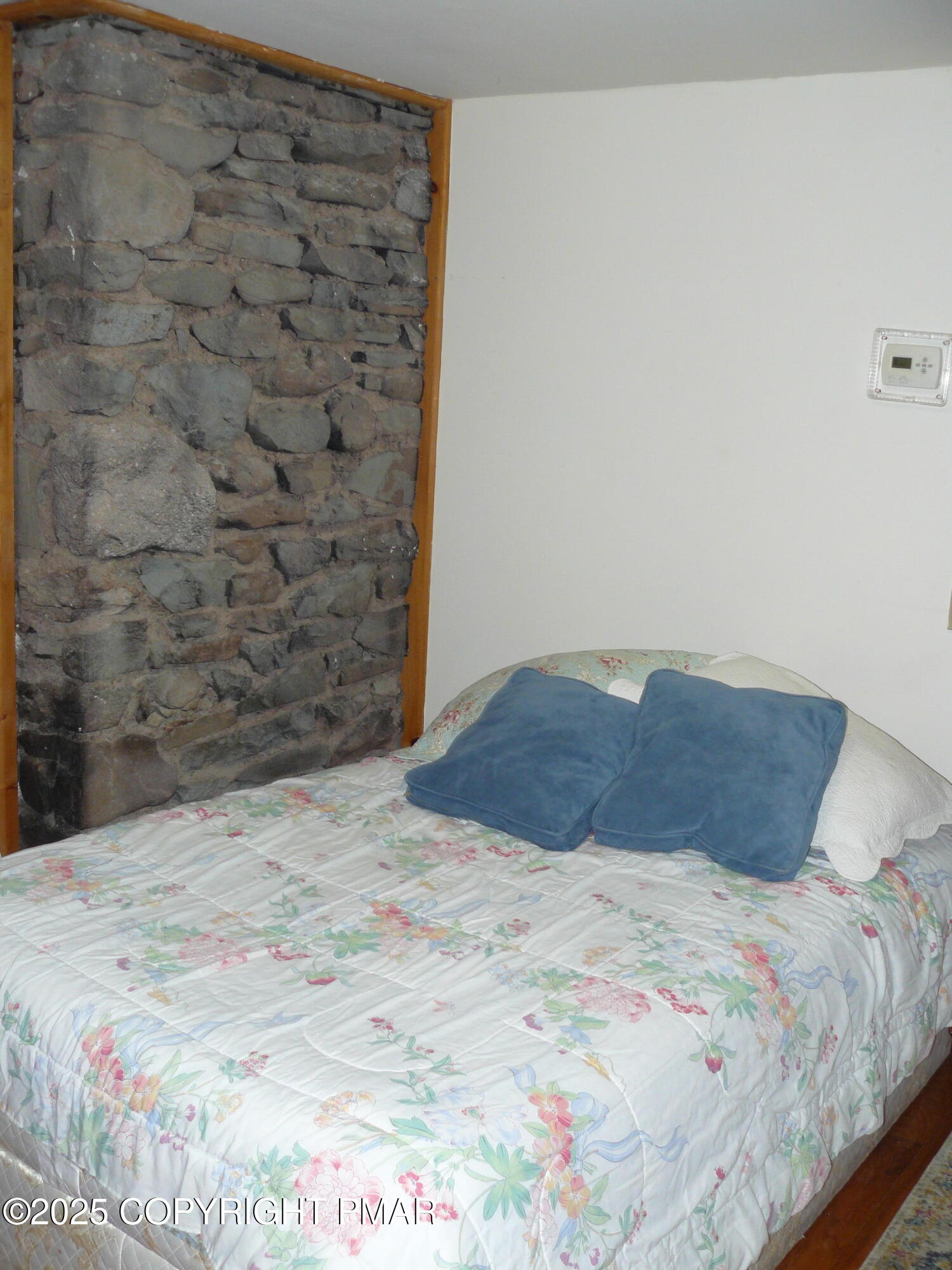 3128 Old Canadensis Hill Road Cresco, PA 18326 - Photo 7 of 9 a bedroom with a bed