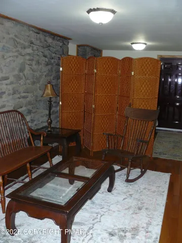 a view of workspace with wooden floor