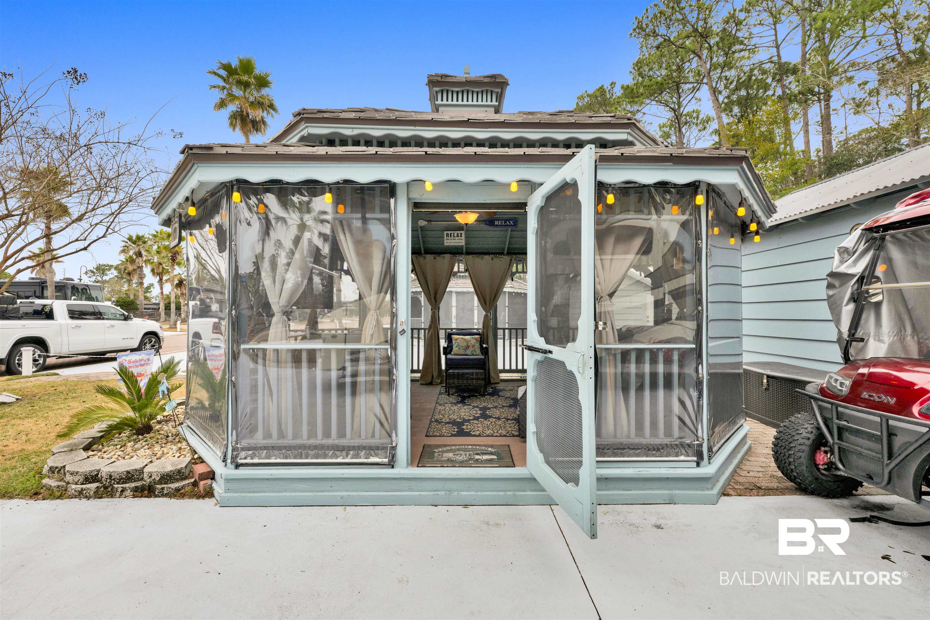 4650 Griffith Marina Road, Unit LOT 24 Orange Beach, AL 36561 - Photo 16 of 34 View of outdoor structure featuring a sunroom