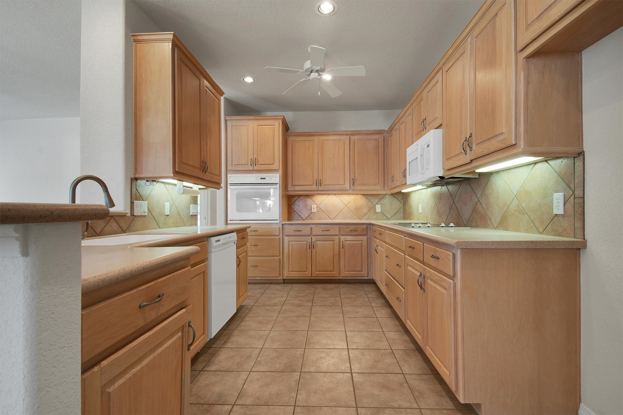 102 Lavaca Lane Georgetown, TX 78628 - Photo 13 of 30 View of the kitchen from the dining room