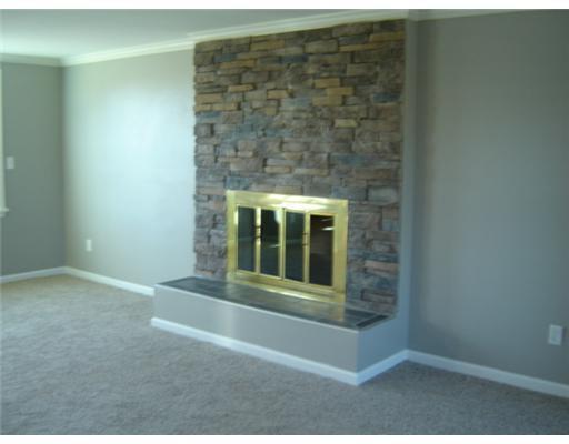 5864 Claridge Road Export, PA 15632 - Photo 3 of 16 Family Room. ON A CHILLY NIGHT, CURL UP WITH A GOOD BOOK IN FRONT OF THE BEAUTIFUL STONE FIREPLACE.