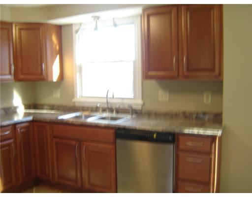 5864 Claridge Road Export, PA 15632 - Photo 5 of 16 Kitchen. STAINLESS STEEL APPLIANCES ARE FEATURED IN THE KITCHEN ALONG WITH DOUBLE SINK, NEW COUNTERTOPS AND CERAMIC TILE FLOOR.