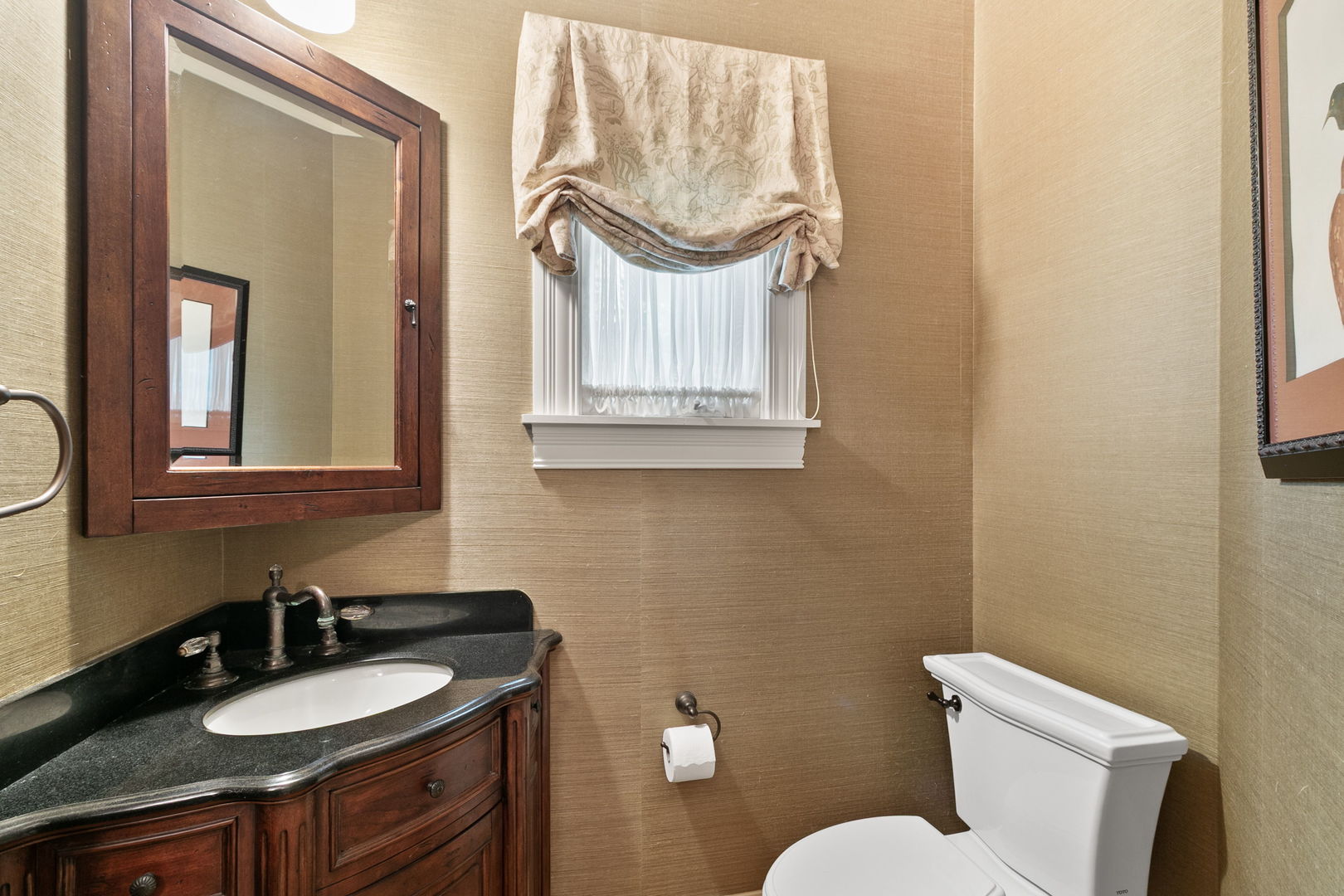 362 Downing Road Riverside, IL 60546 - Photo 14 of 40 a bathroom with a granite countertop toilet sink and mirror