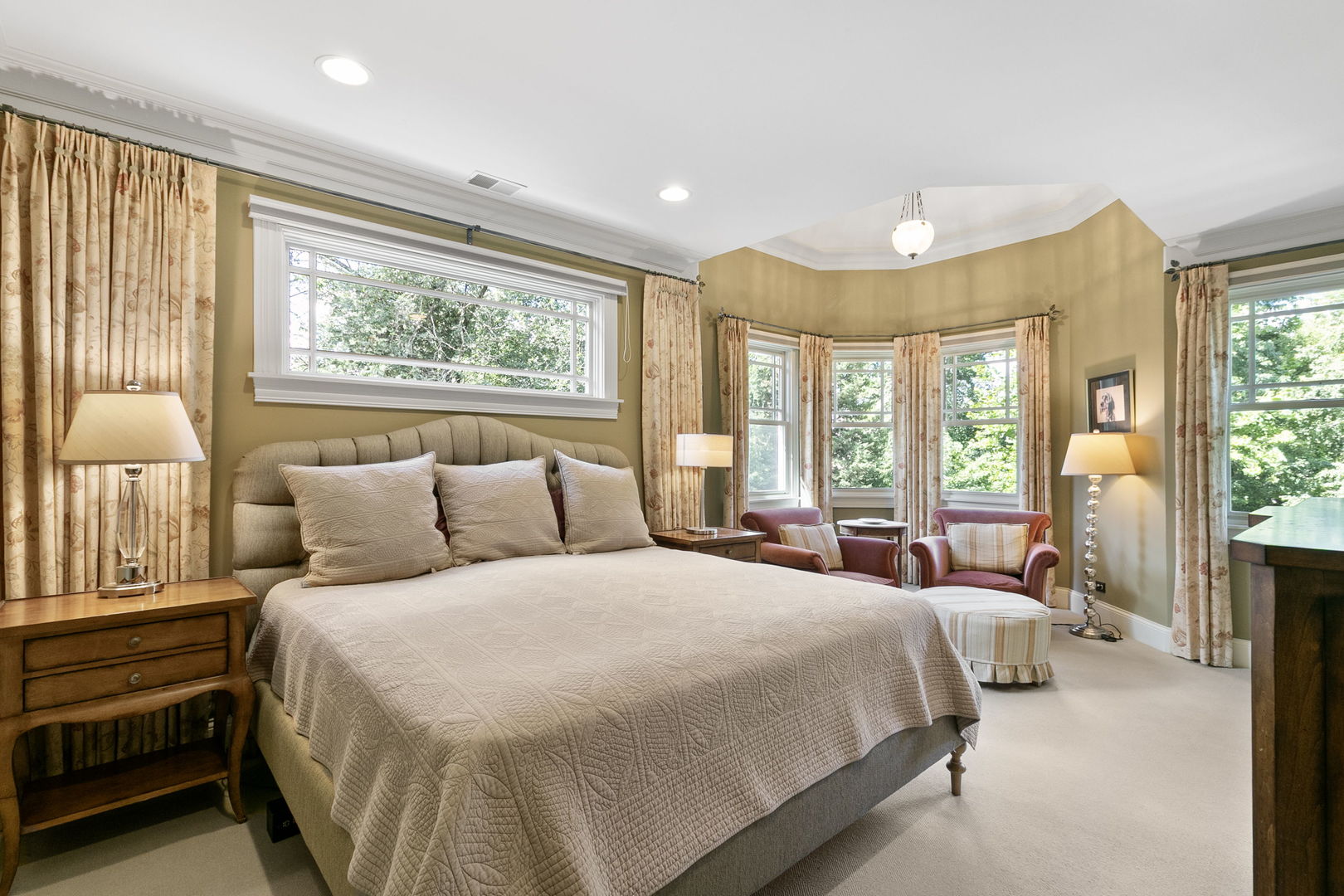 362 Downing Road Riverside, IL 60546 - Photo 16 of 40 a large bedroom with a bed and large windows