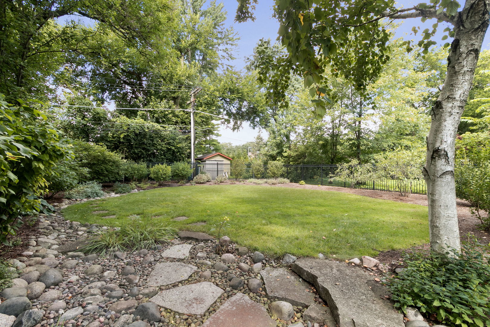 362 Downing Road Riverside, IL 60546 - Photo 29 of 40 a view of a backyard with a garden