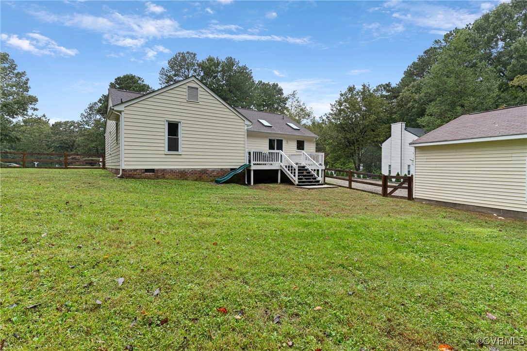4405 Rabbit Foot Place Chesterfield, VA 23236 - Photo 11 of 38 a backyard of a house with table and chairs