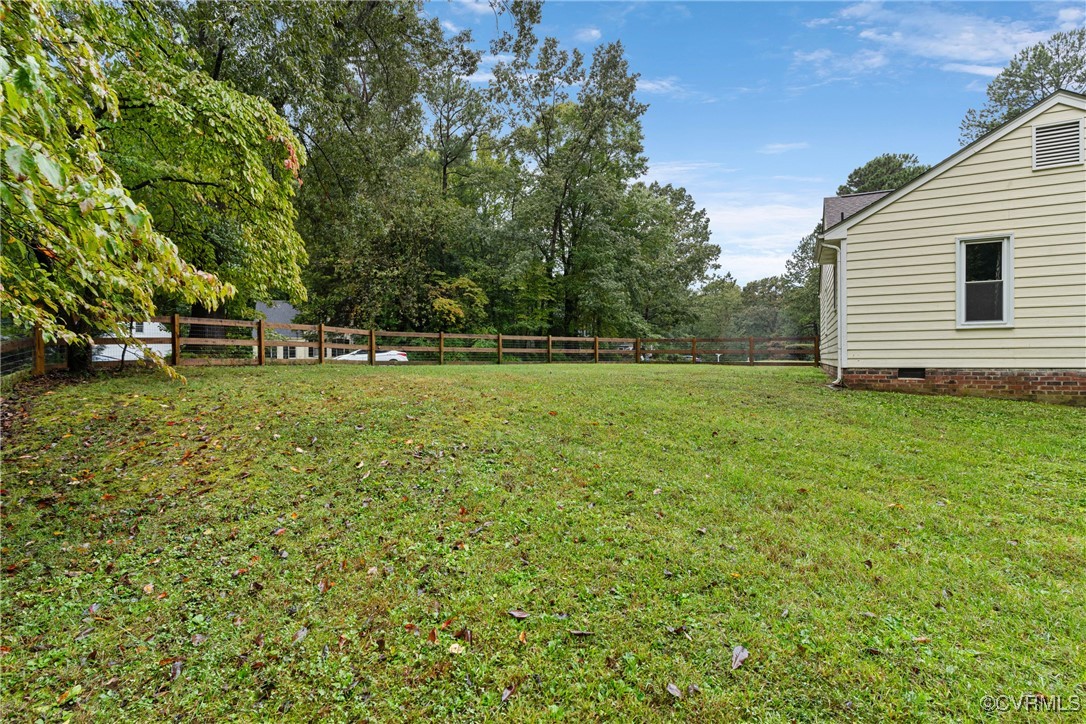4405 Rabbit Foot Place Chesterfield, VA 23236 - Photo 13 of 38 a view of a backyard with a small cabin