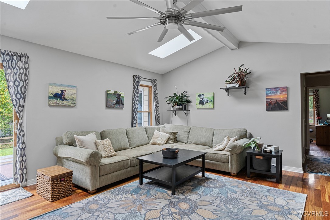 4405 Rabbit Foot Place Chesterfield, VA 23236 - Photo 20 of 38 a living room with furniture a rug and a chandelier