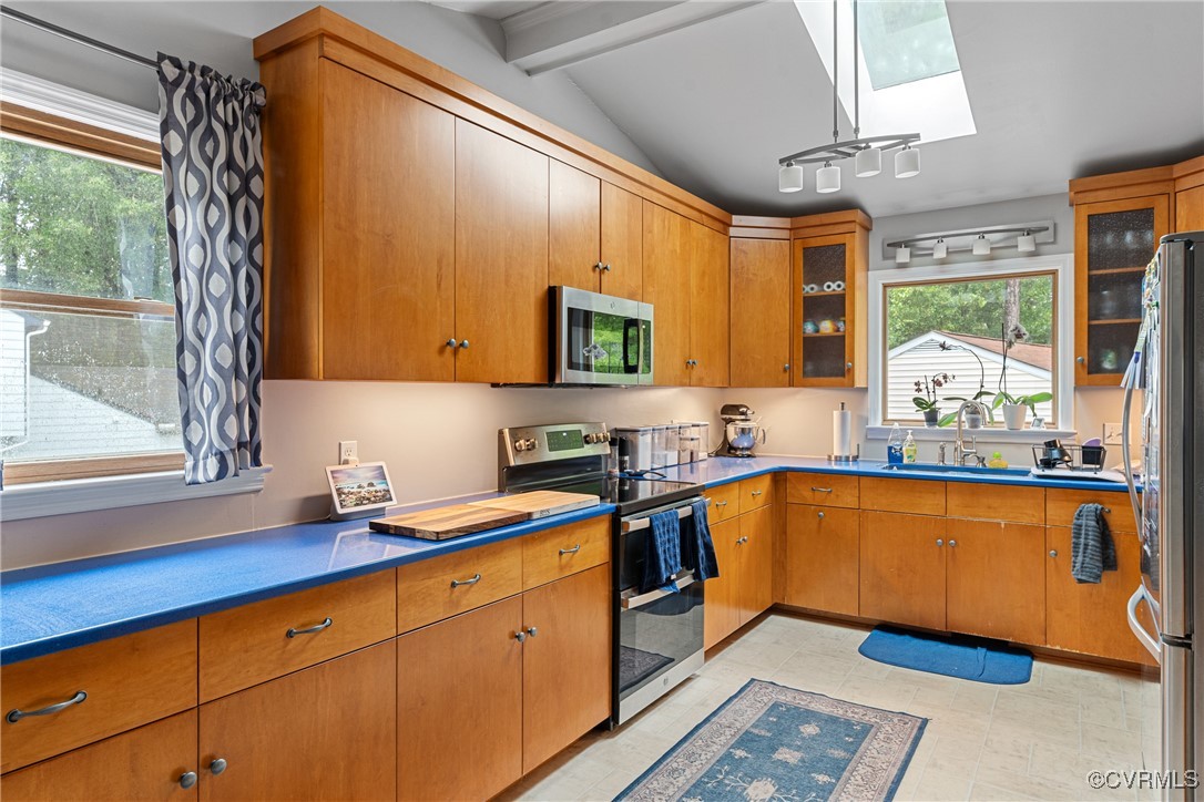 4405 Rabbit Foot Place Chesterfield, VA 23236 - Photo 27 of 38 a kitchen with stainless steel appliances granite countertop wooden floors and sink