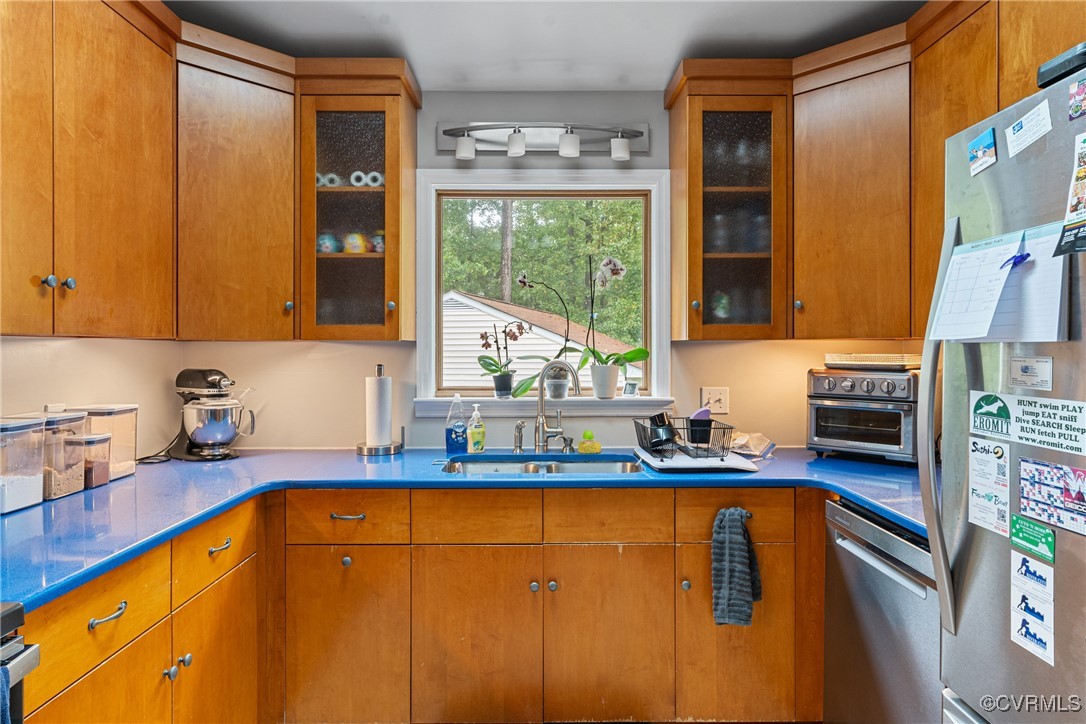 4405 Rabbit Foot Place Chesterfield, VA 23236 - Photo 29 of 38 a kitchen with stainless steel appliances granite countertop sink stove and cabinets