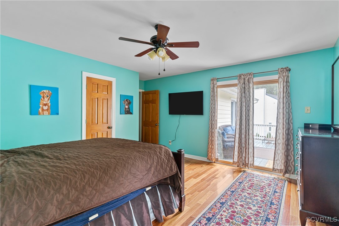 4405 Rabbit Foot Place Chesterfield, VA 23236 - Photo 32 of 38 a bedroom with a bed and a flat screen tv