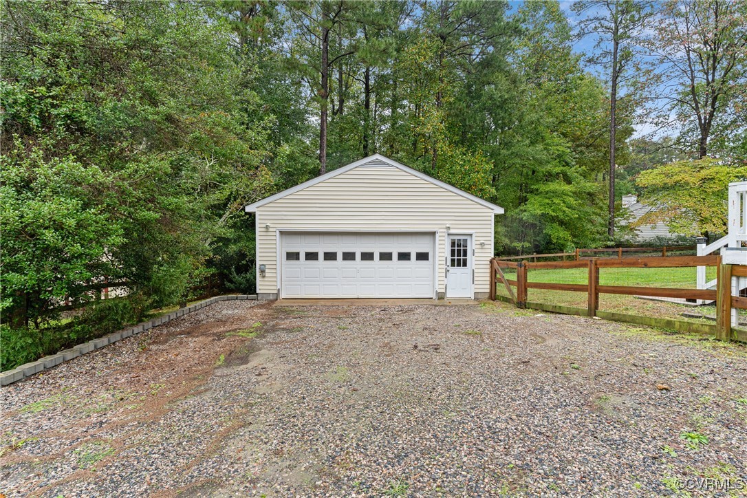4405 Rabbit Foot Place Chesterfield, VA 23236 - Photo 8 of 38 a view of a house with large trees and fence