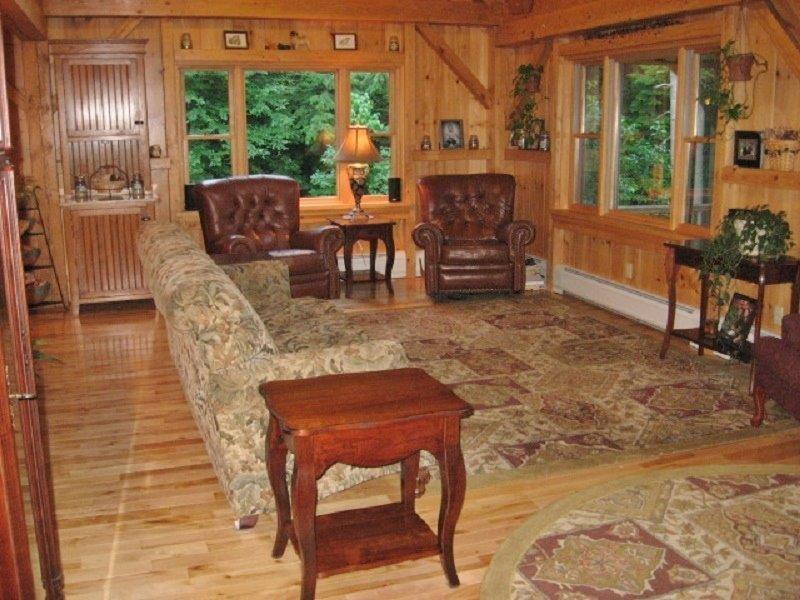 492 W Road Sangerville, ME 04479 - Photo 16 of 33 Great room with plenty of windows to...