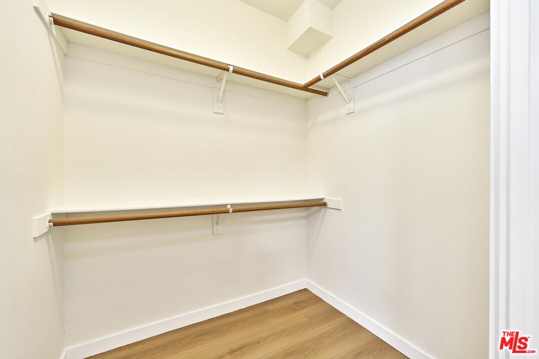 2864 Sunset Place, Unit 203 Los Angeles, CA 90005 - Photo 19 of 21 a view of a room with wooden floor