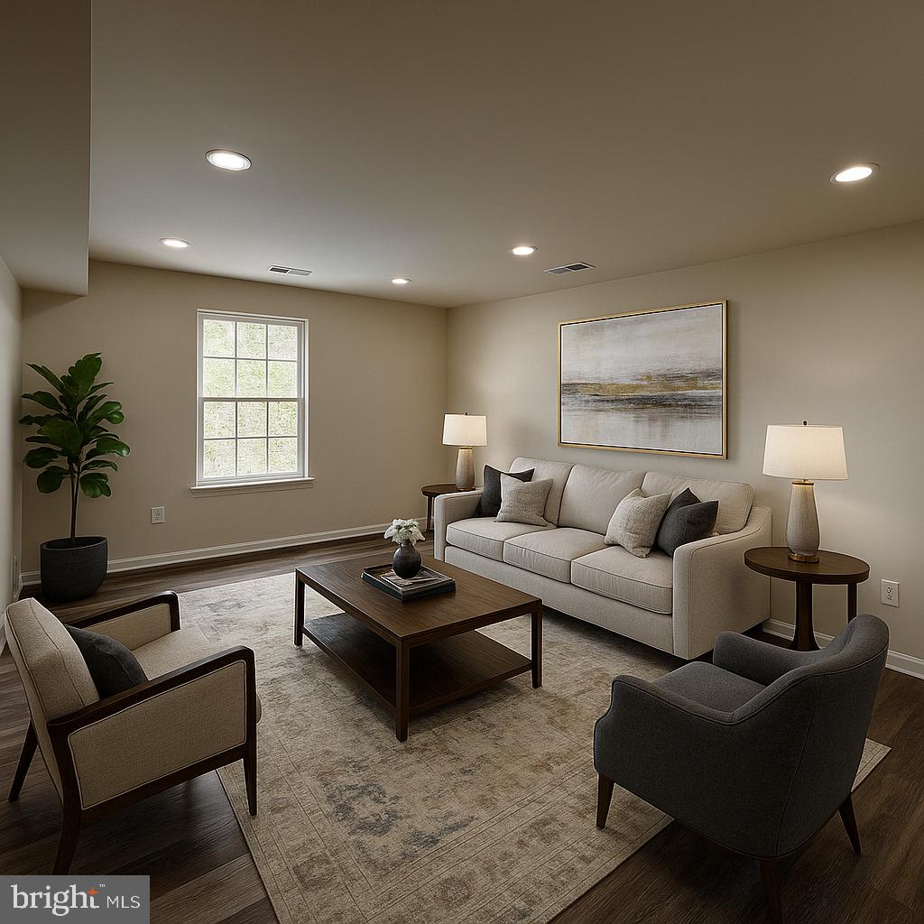 12800 Asbury Drive Fort Washington, MD 20744 - Photo 22 of 53 a living room with furniture a window and a lamp